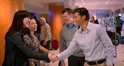 Guests greeting each other in the lobby of a Disney Resort hotel