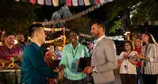 Guests presenting an award to an employee at a corporate event at Disney’s Animal Kingdom theme park