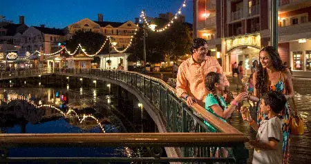A family of 4 enjoying ice cream cones at Disney's Boardwalk Resort