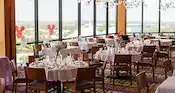 Set tables and Mickey Mouse ballons inside California Grill restaurant