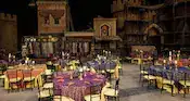 Tables set at the Indiana Jones Epic Stunt Spectacular at Disney's Hollywood Studios
