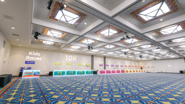The Magic Kingdom Ballroom serving as a registration area for races, including kids races and a half marathon