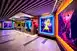 The Pixar Place Hotel lobby, featuring artwork from various Pixar films