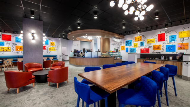 A café decorated with sketches of Pixar characters