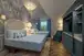 Suite with a king size bed at Disney's Grand Floridian Resort & Spa